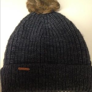 Free people beanie hat made out of wool & acrylic.